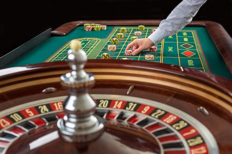 Antarmuka Dragon Tiger Live di aplikasi kang bet menampilkan meja permainan, posisi kartu, dan tombol pemasangan taruhan